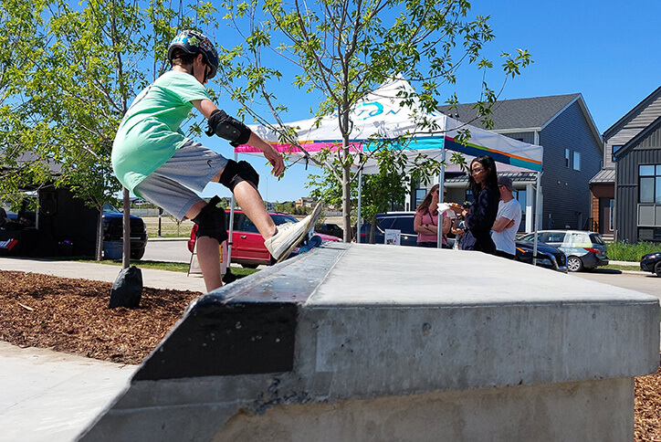 Skateboarding at Seton community skatepark in Calgary, Albetra