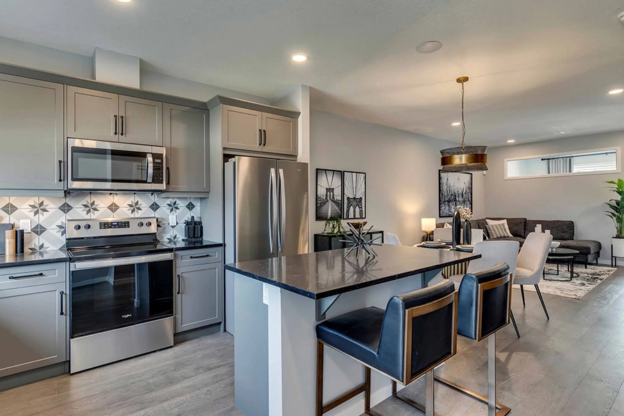 Raeya Kitchen and Living by Trico Homes in Seton Community SE Calgary